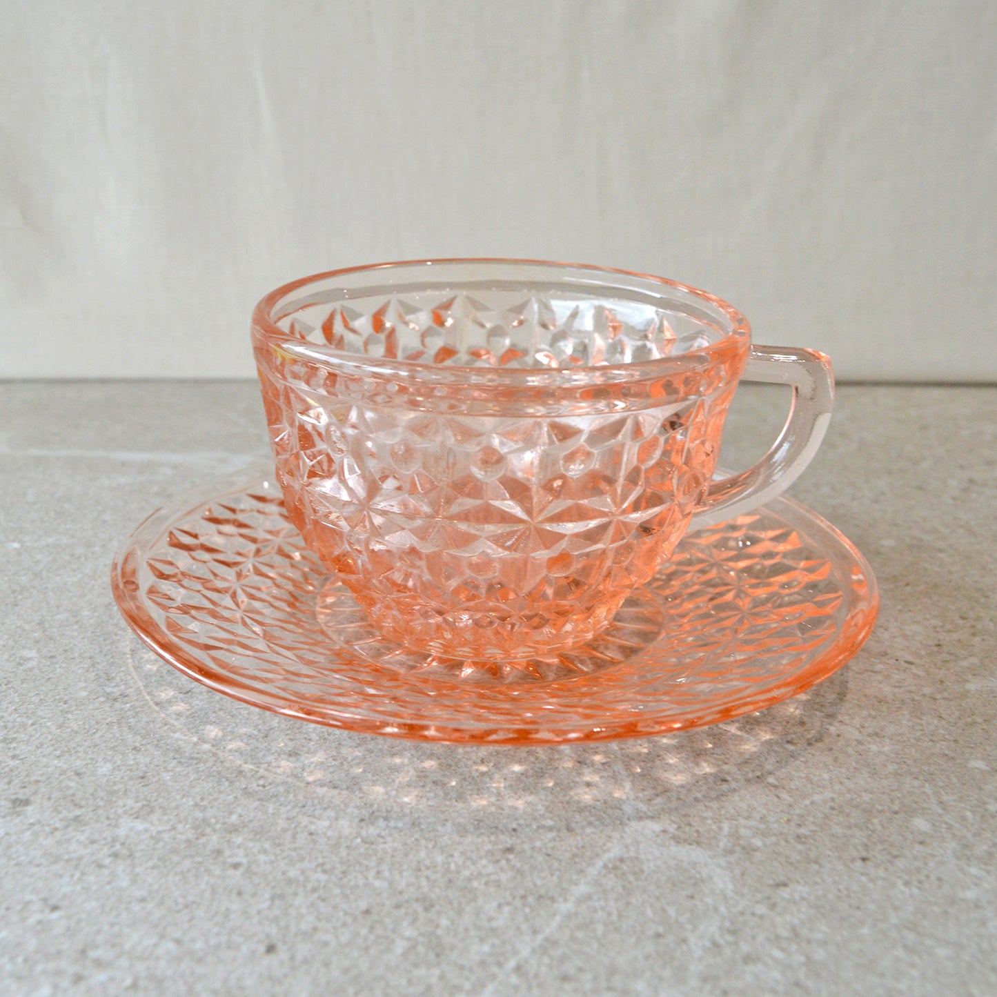 Vintage Jeannette Holiday Button & Bows Pink Cup & Saucer (1940s)